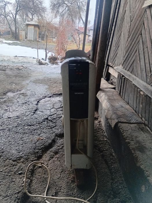 Продам обогреватель масляный