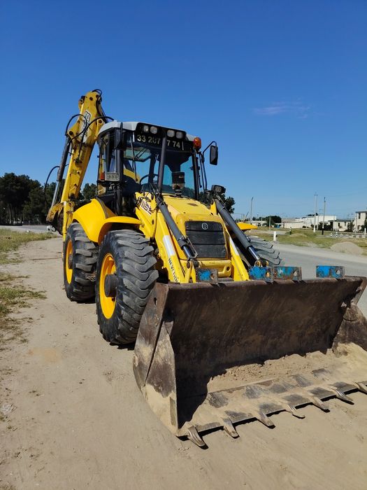 New Holland 115 Pagruzchik