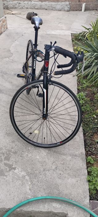 Шоссейный велосипед TrinX