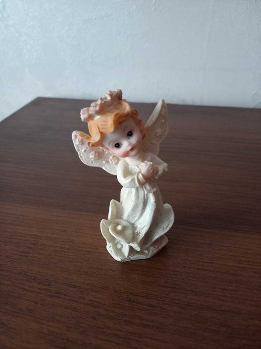 Продам статуэтки: ангелы, барс.