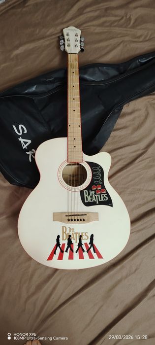 Gitara sotiladi holati zo'r