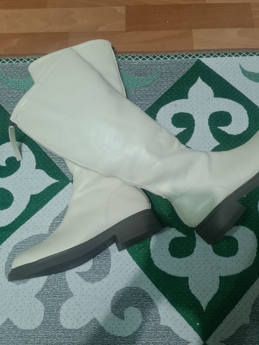 Продам новые зимние сапоги