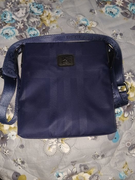 Барсетка новая продаю