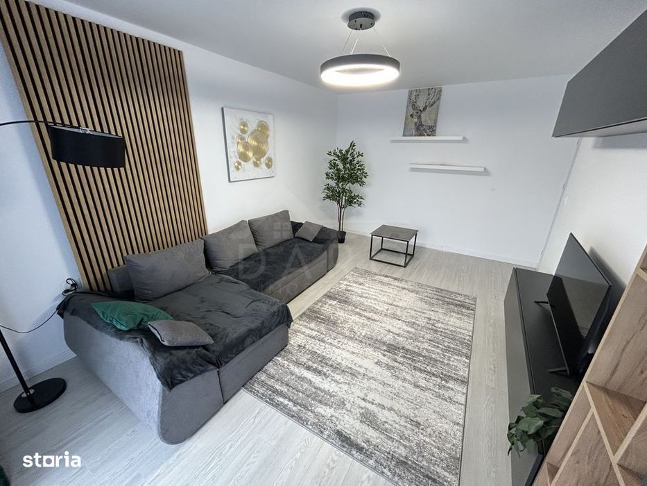 Apartament 2 camere nou, mobilat complet, parcare inclusă — fotografia 1