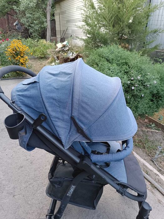 Продам прогулочную коляску TOMIX, б/у