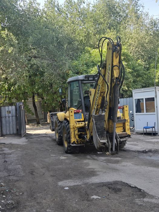 Услуги экскаватора погрузчика гидромолот