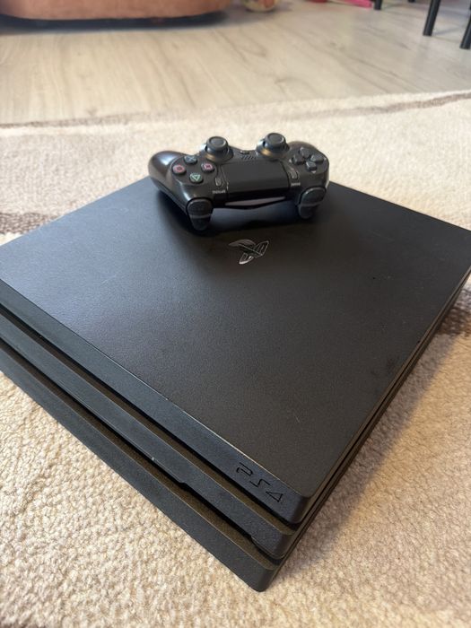 Play station 4 foarte putin folosit e de un Tera