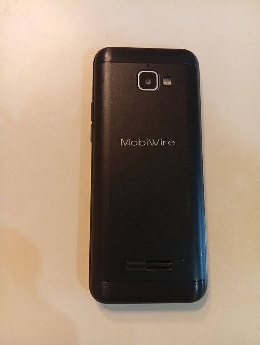 Телефон с копчета  : Mobi Wire