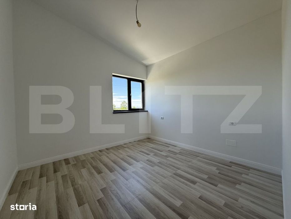 Casa pe parter cu un design deosebit, zona nordica / Simnicul de Jos