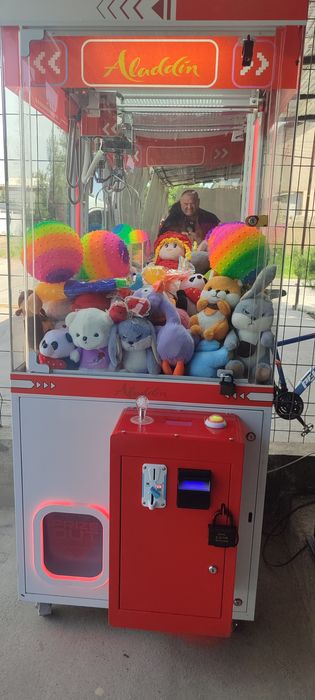 Игровой аппарат кран хватка