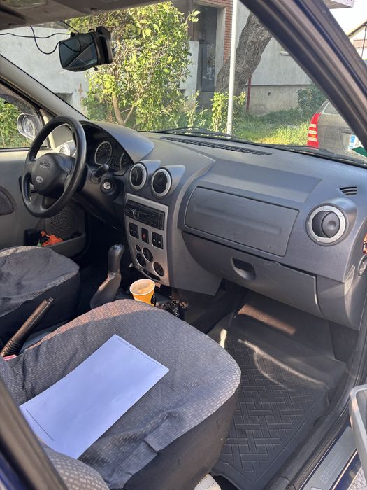 Logan 1.4 bezina cu gaz.