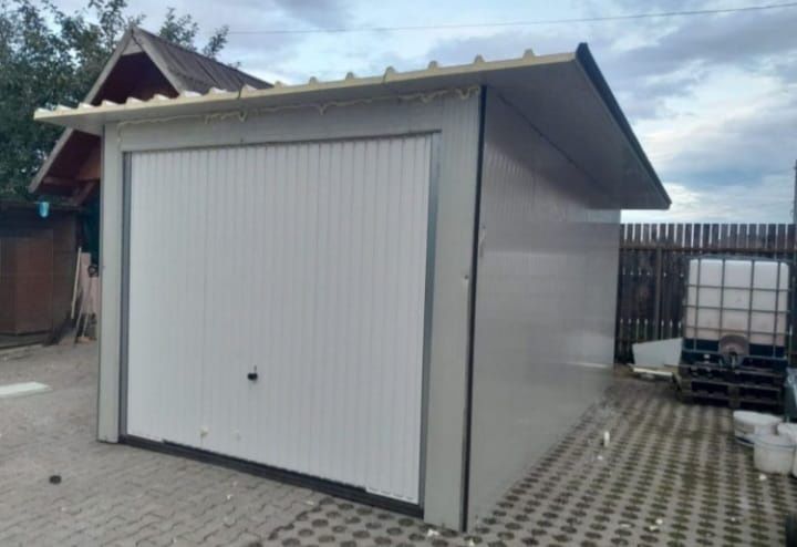Garaje auto pe structura metalica invelite in panouri termoizolante detali la telefon