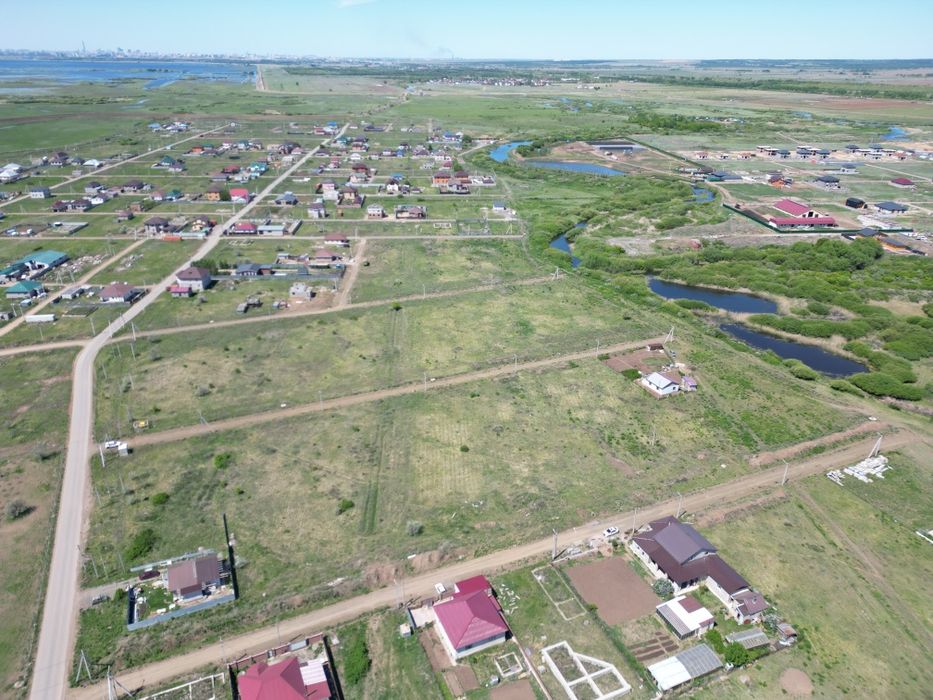 Участки возле реки в 6 микрорайоне