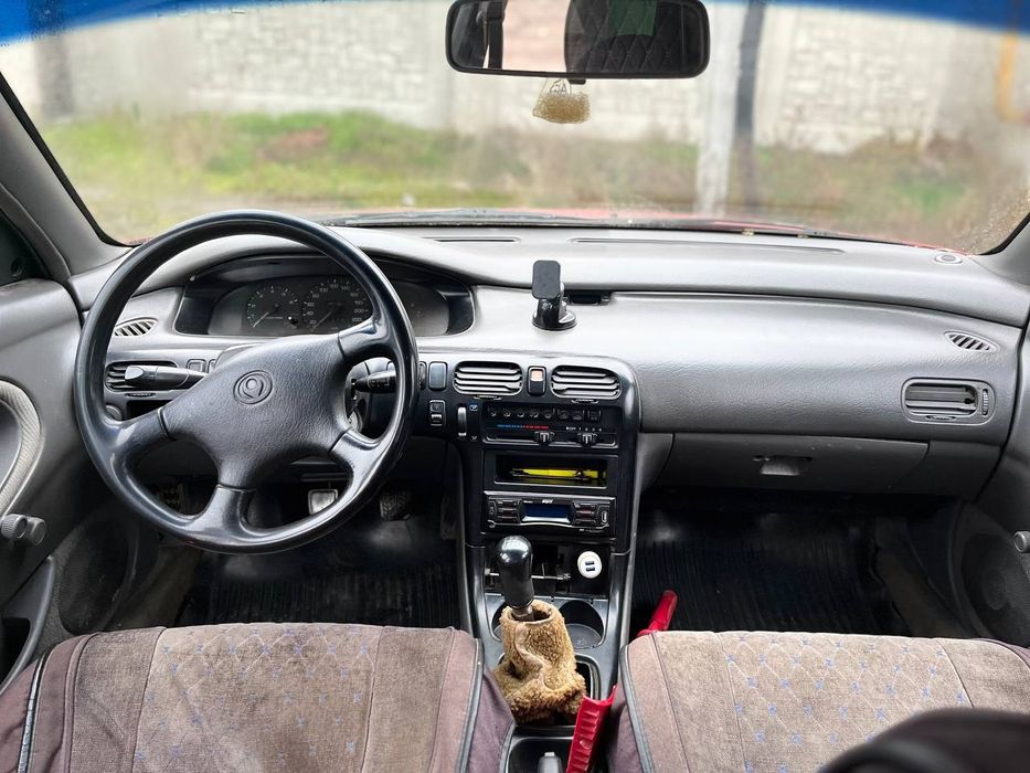 Продам машину мазда кронс