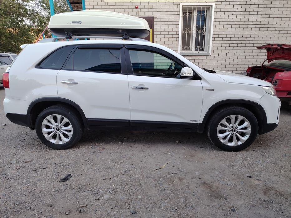 Kia sorento 2013 год