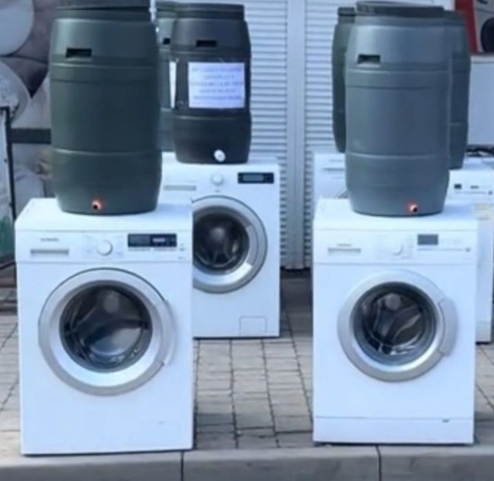 Masina de spălat rufe  pe butoi