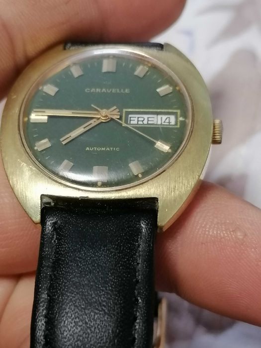 Caravelle by Bulova Day Date automatic Swiss
