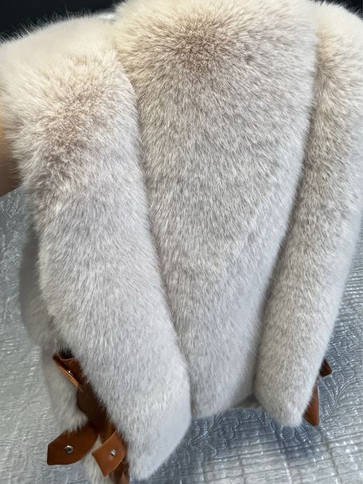 Дамски пухен елек