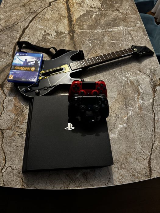 PlayStation 4 1TB + 2 manete originale + Guitar Hero Live (cu chitara)