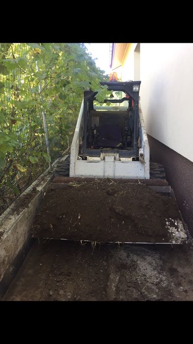 Lucrari cu buldo cu picon miniexcavator bobcat