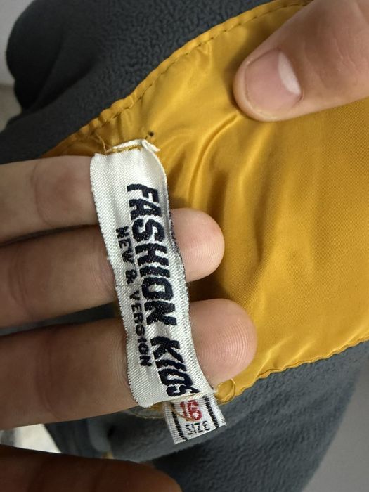 Продава се  спортен елек (грейка) Fashion Kids в свеж жълт цвят.