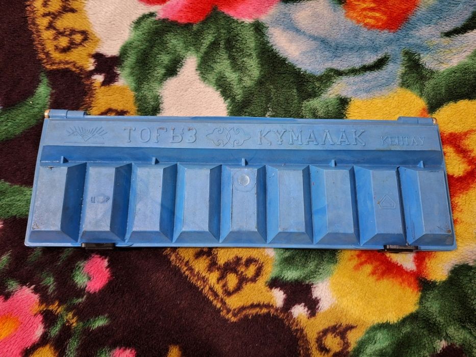 Тоғызқұмалақ настольная игра