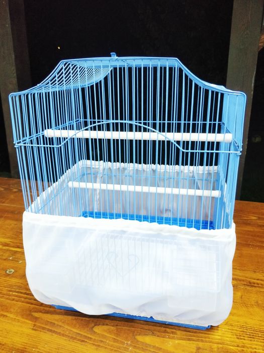 Husa colivie. Protecție împotriva mizeriei. Papagali, canari, cinteze