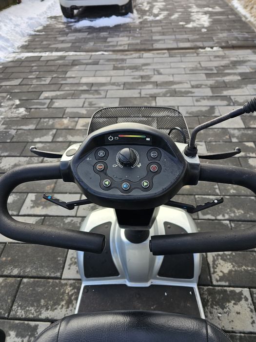 Scuter electric carut persoana cu dizabilitati  invocare