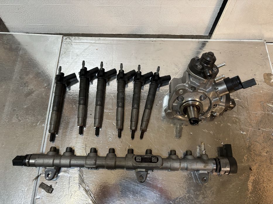 Помпа с дюзи и рейл Bmw b57