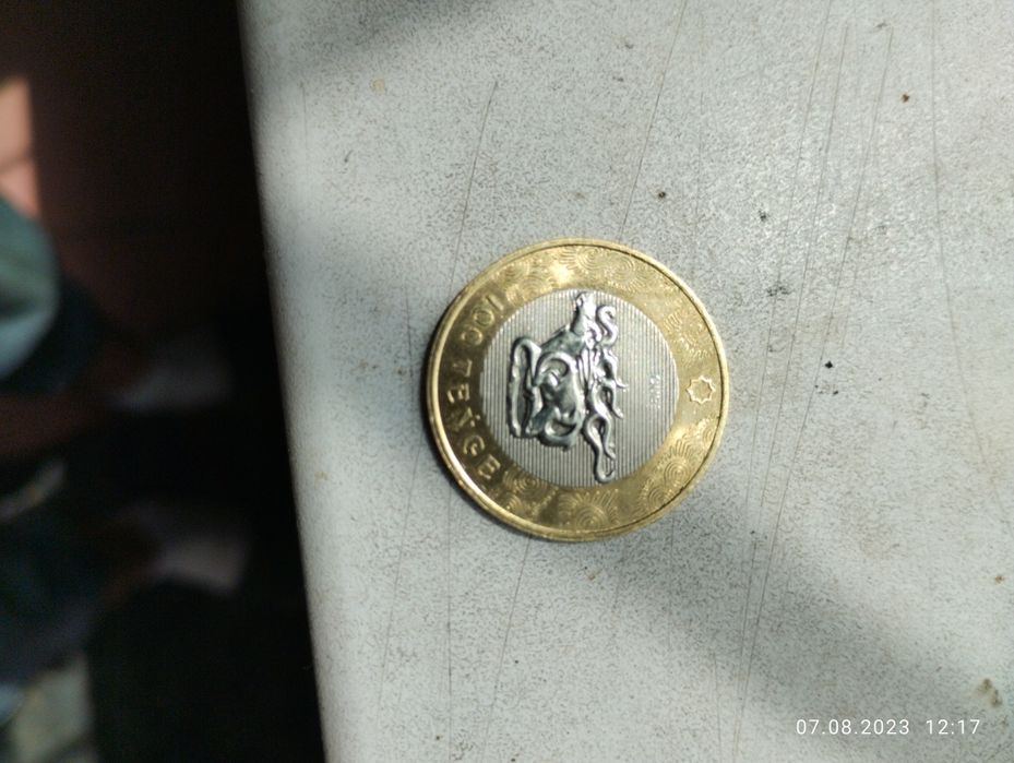 Продам монету 100 TEHGE