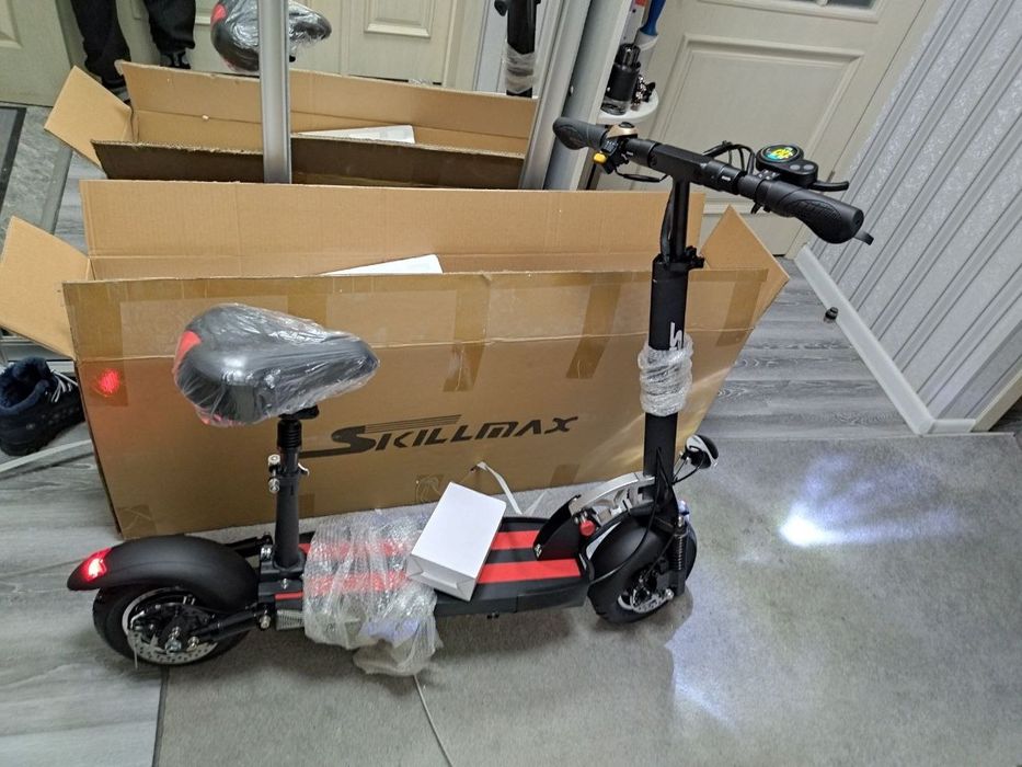 Новые электросамокаты со склада в коробке