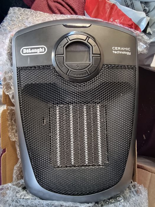 Delonghi керамична печка с дистанционно