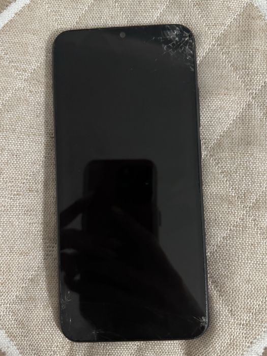 Redmi телефон.