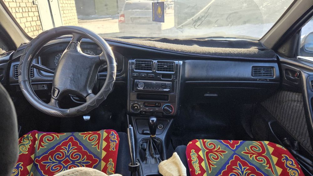 Продам тойоту карина е