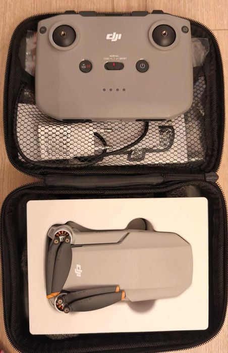 Dronă DJI Mini 4K în garanție, aproape nouă, cu card SD