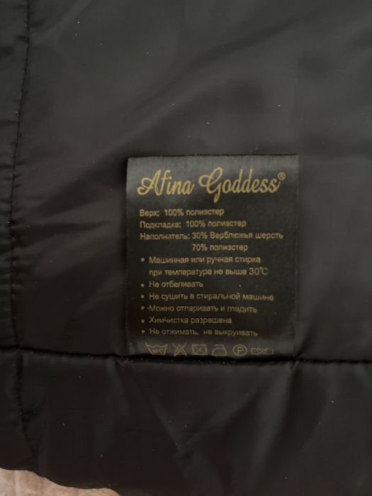 Женский пуховик с норкой