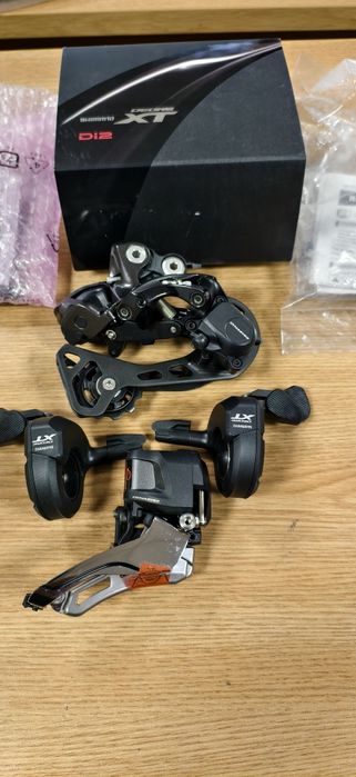 Shimano Deore XTR,XT Di2 дерайльори + команди МТБ
