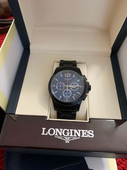 Longines Conquest V.H.P. Chronograph watch in black PVD with a blue.
