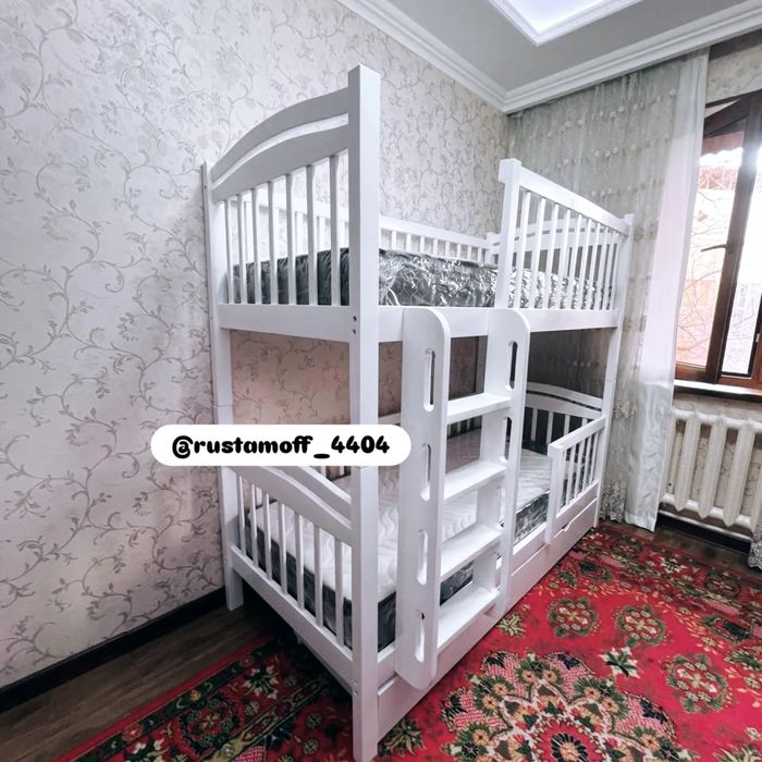 Двухьярусная кроватиь