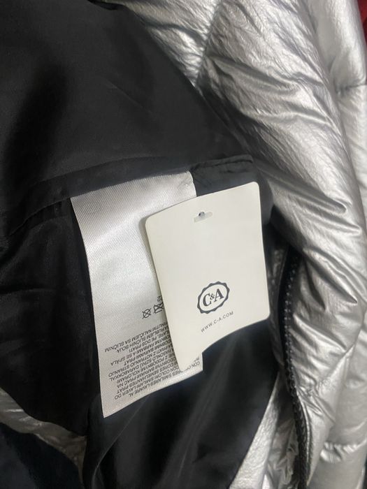 Пуховик стального цвета