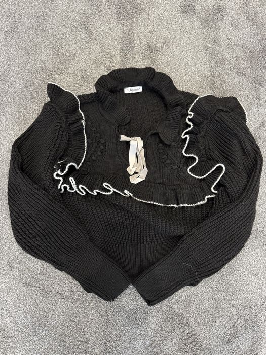 Дамски пуловери и блузи