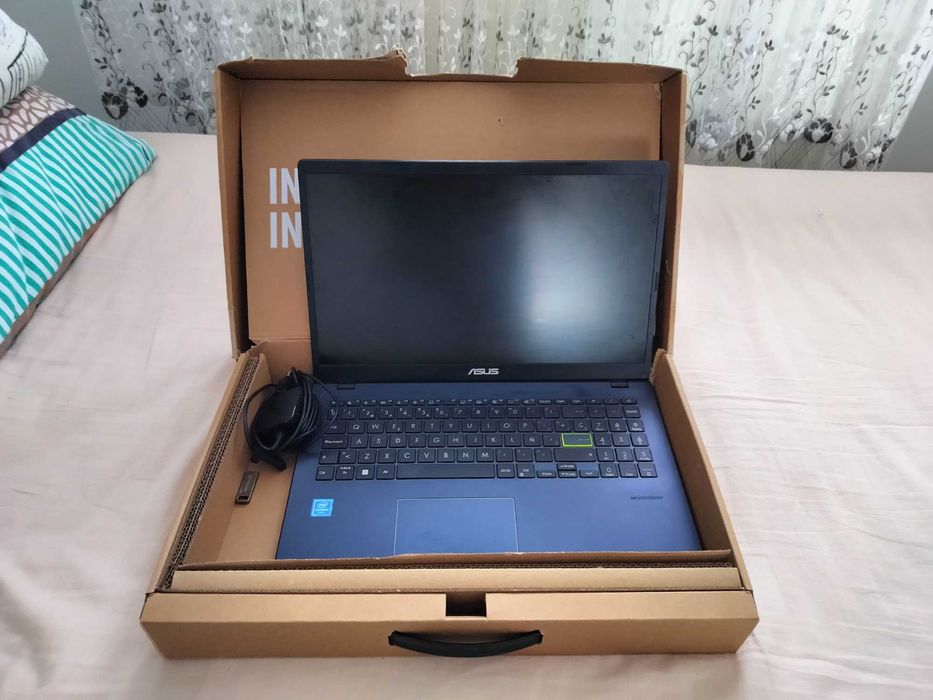 Laptop ASUS E510 (15.6") – Utilizat 9 luni, stare perfectă, ca nou!