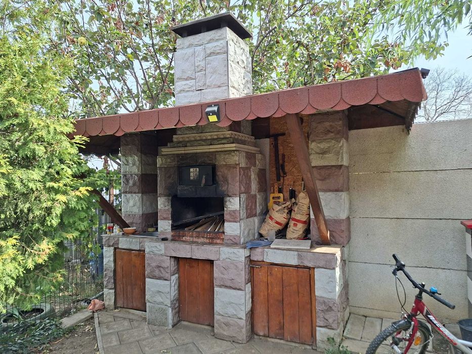 Vand casa parter 120 mp,teren 1000 mp + foisor si bucatarie vara 50 mp