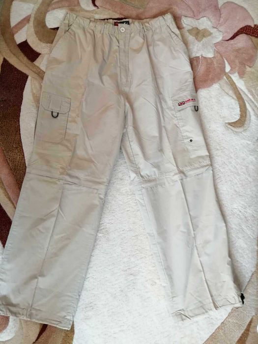 Чисто нов мъжки панталон ХЛ, на ластик с махащи се крачоли с цип 2 в 1