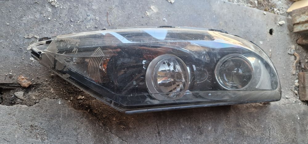 Фара передняя Kia Sportage