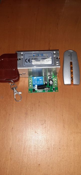 Mecanism pentru acționare electrică ușă garaj