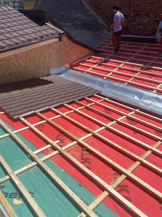 Executam reparati mansardari terase