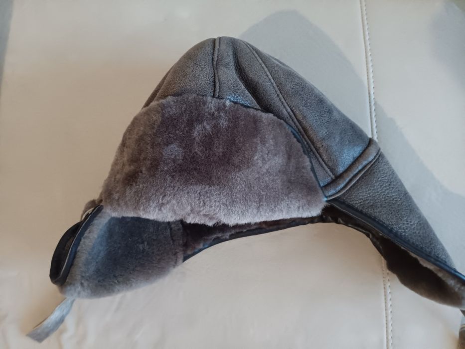 Кожена зимна шапка ушанка. шапка плетена
