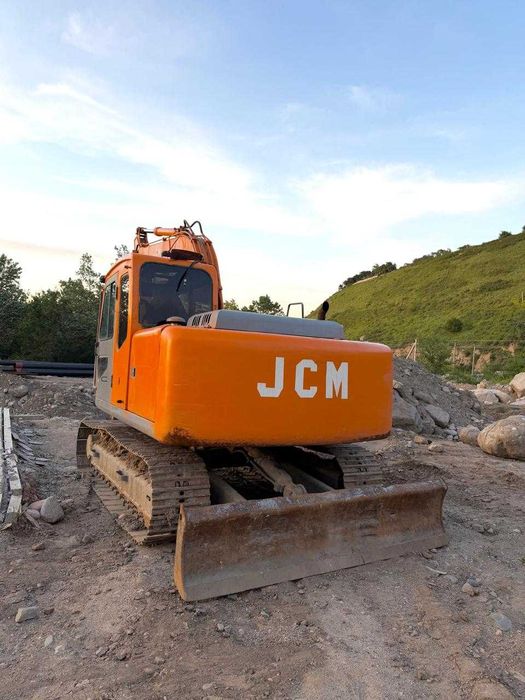 Экскаватор JCM 913  в рабочем состоянии  2007 г.