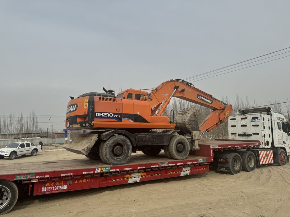 Услуга эксковатора колёсный 210W